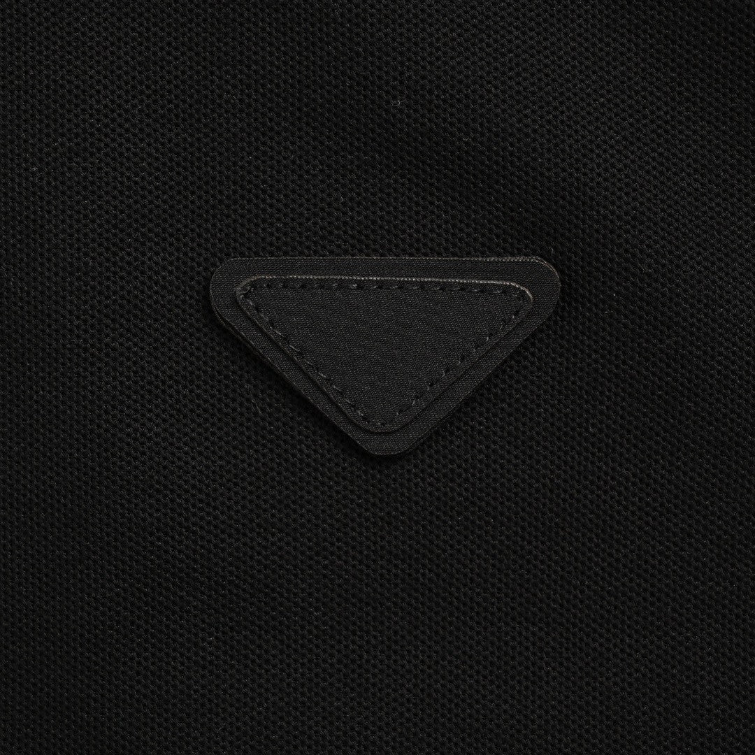 Timeless Prada Black Polo Shirt for Effortless Elegance