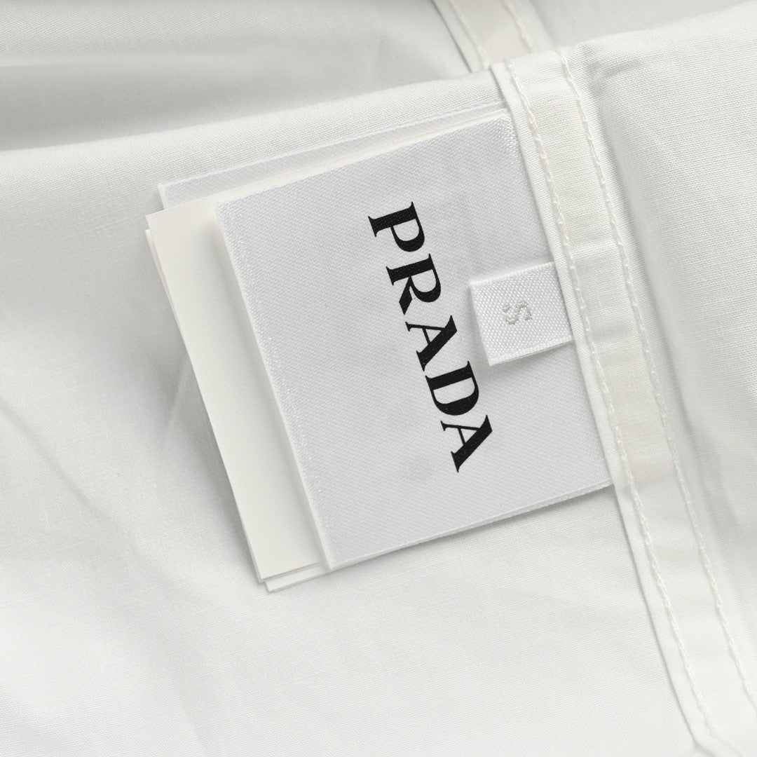 Chic White Short-Sleeve Button-Up Shirt by Prada