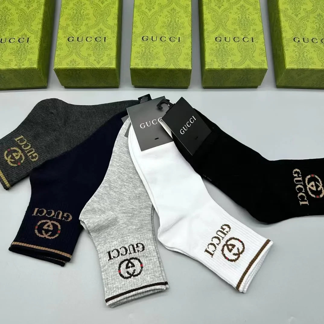 GUCCI || GG Logo Striped Ribbed Cotton-Blend Socks