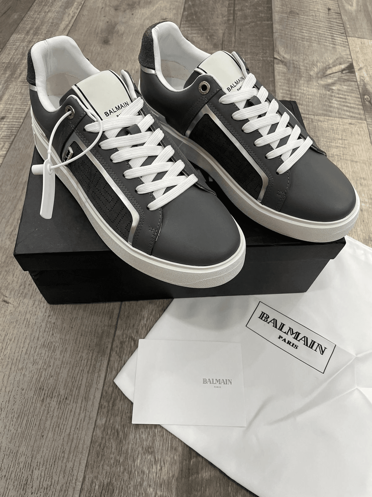 BALMAIN || B-COURT GRAY LEATHER SNEAKERS WITH PERFORATIONS