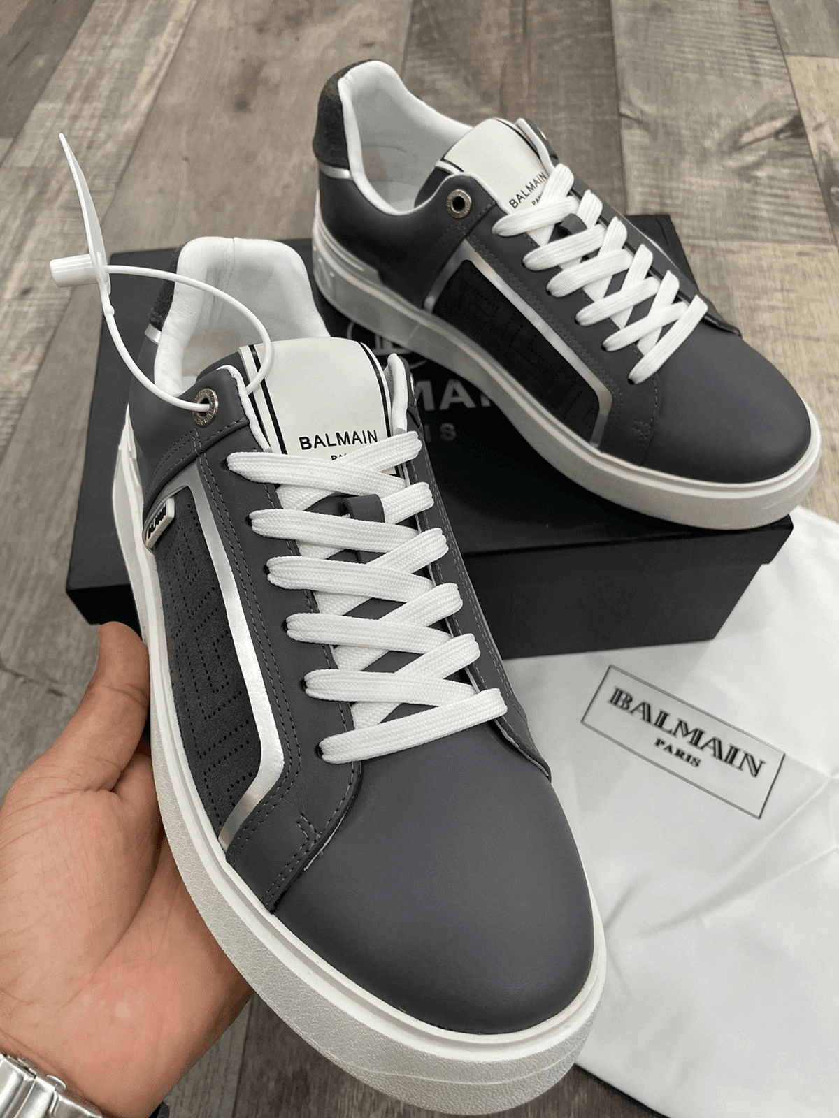 BALMAIN || B-COURT GRAY LEATHER SNEAKERS WITH PERFORATIONS