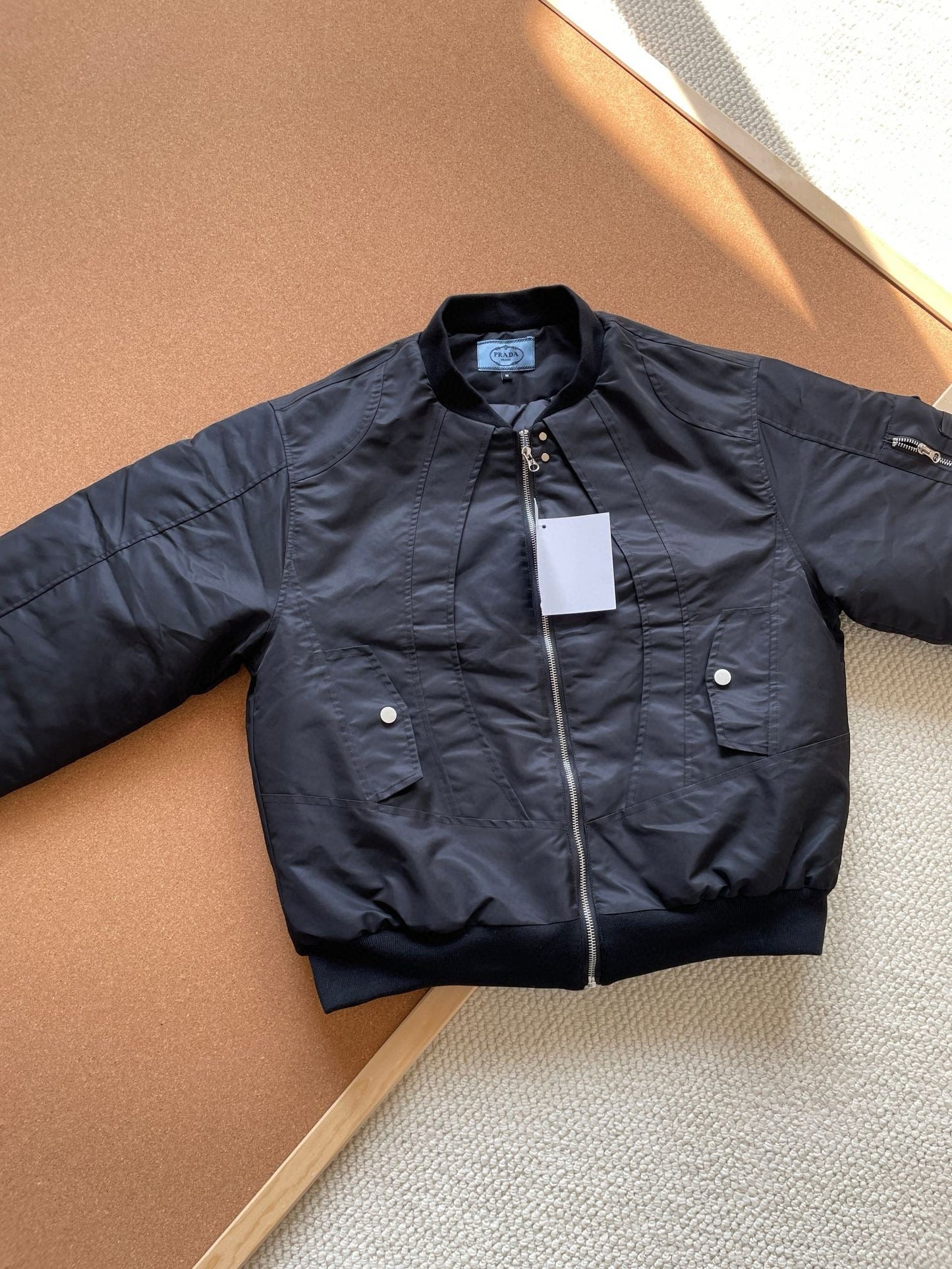 PRADA RE-NYLON PUFFER JACKET MAN